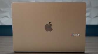 A MacBook Air opened on a table.
