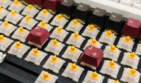 An image showing an Old Keychron K2V2 keyboard with dust particles on it.