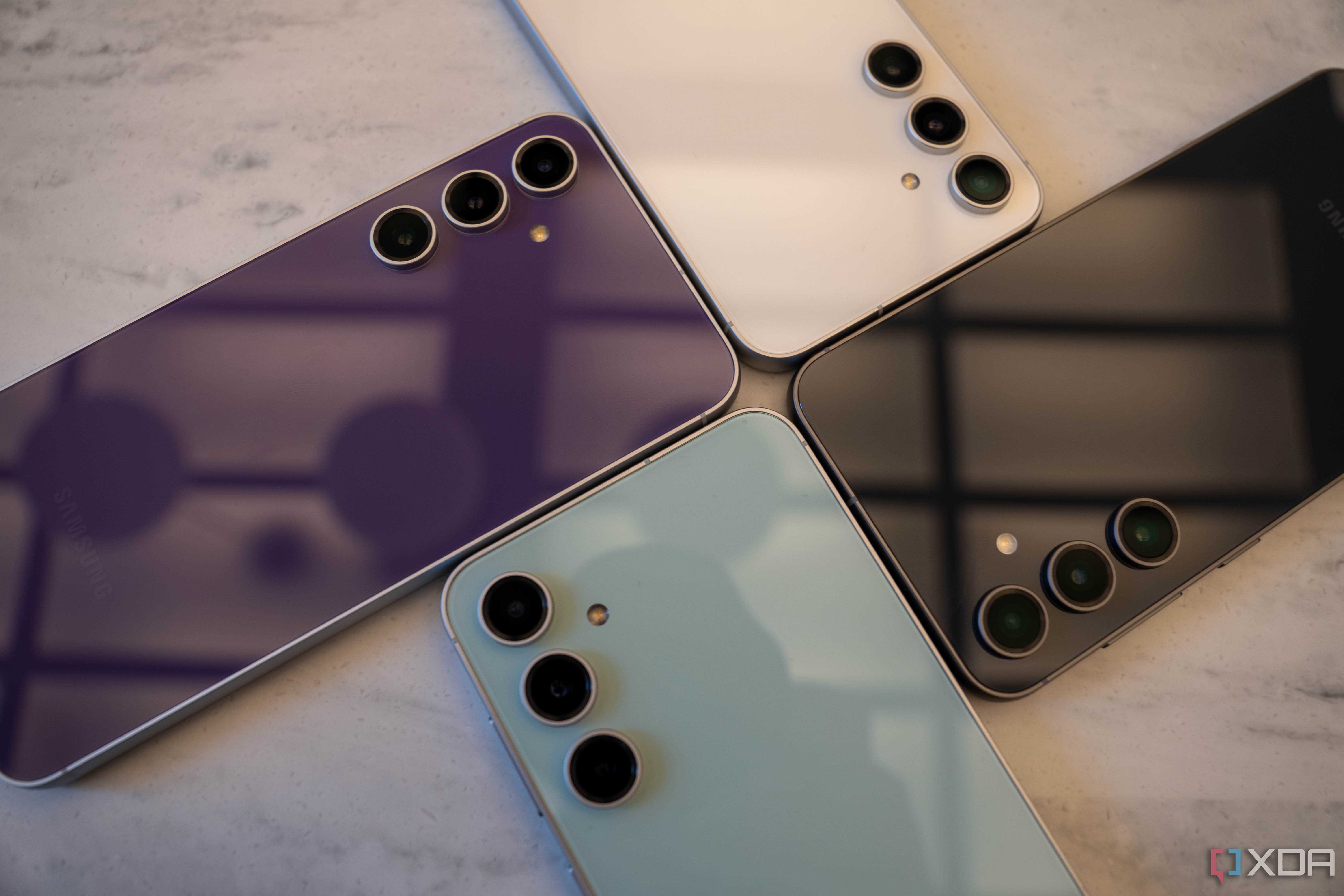 Four Samsung Galaxy S23 FE smartphones.