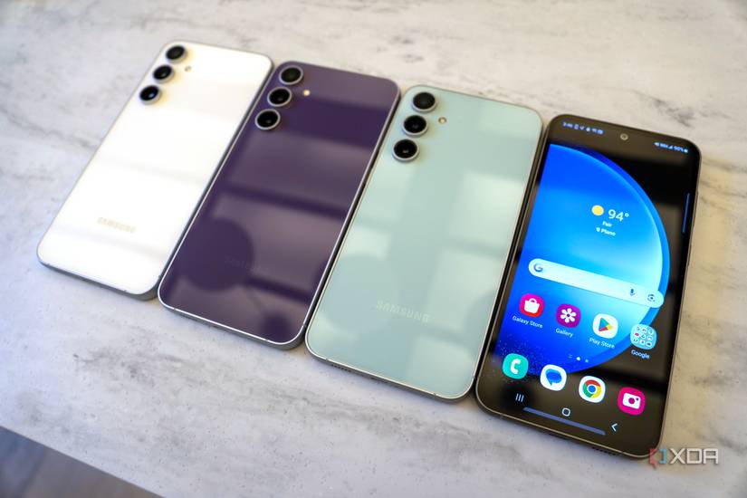 Four Galaxy S23 FE phones in a row with the last one screen-side up.