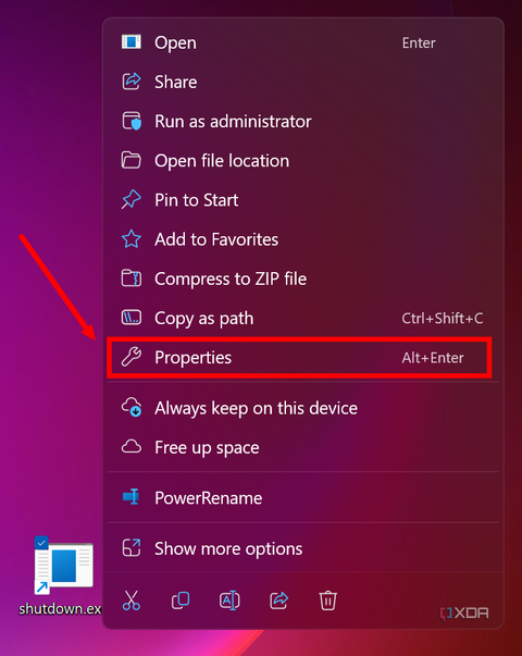 Screenshot of a Windows 11 desktop with a context menu for a shutdown shortcut. The Properties option is highlighted