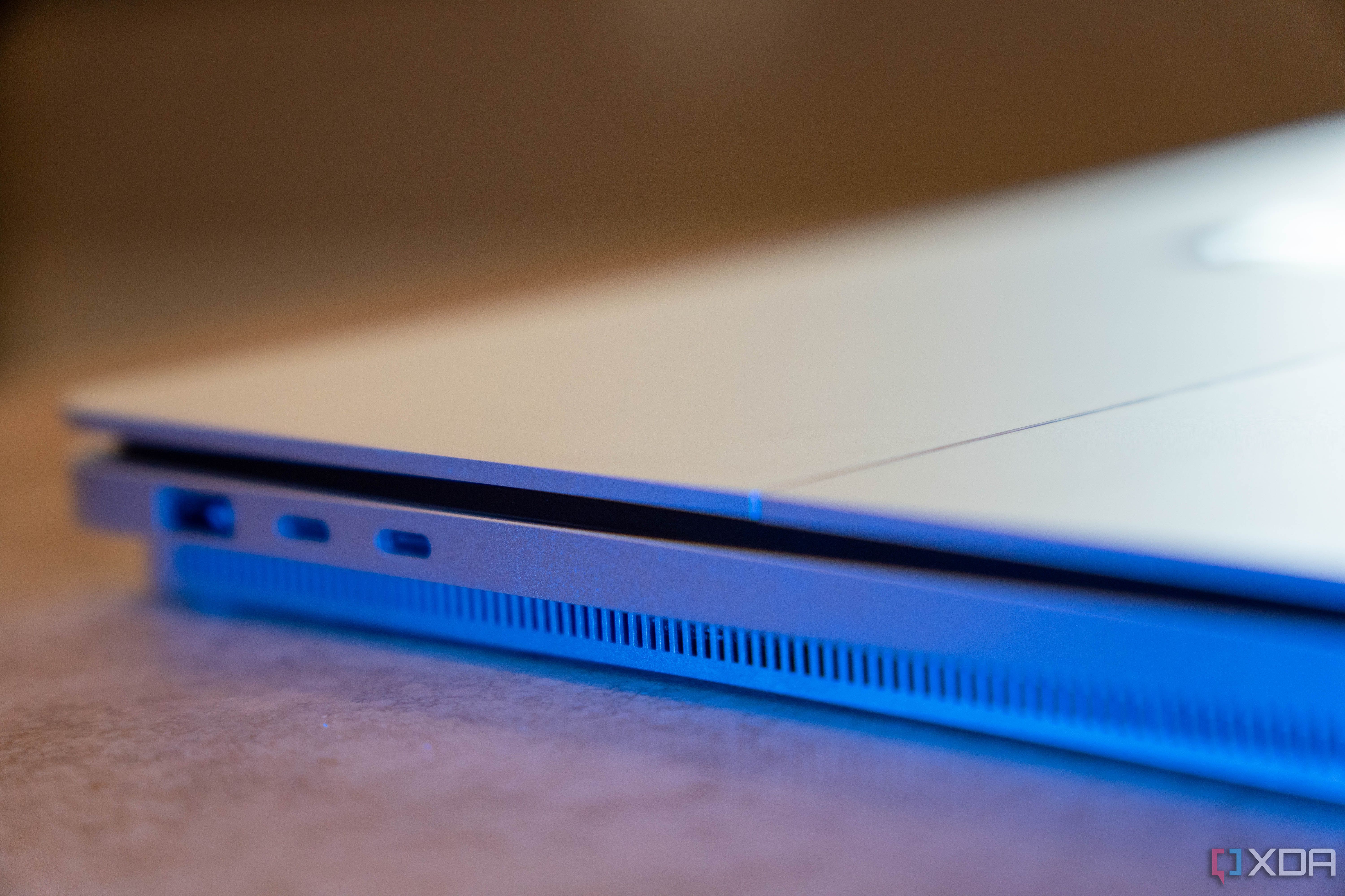 Angled view of two USB-C ports and one USB-A port