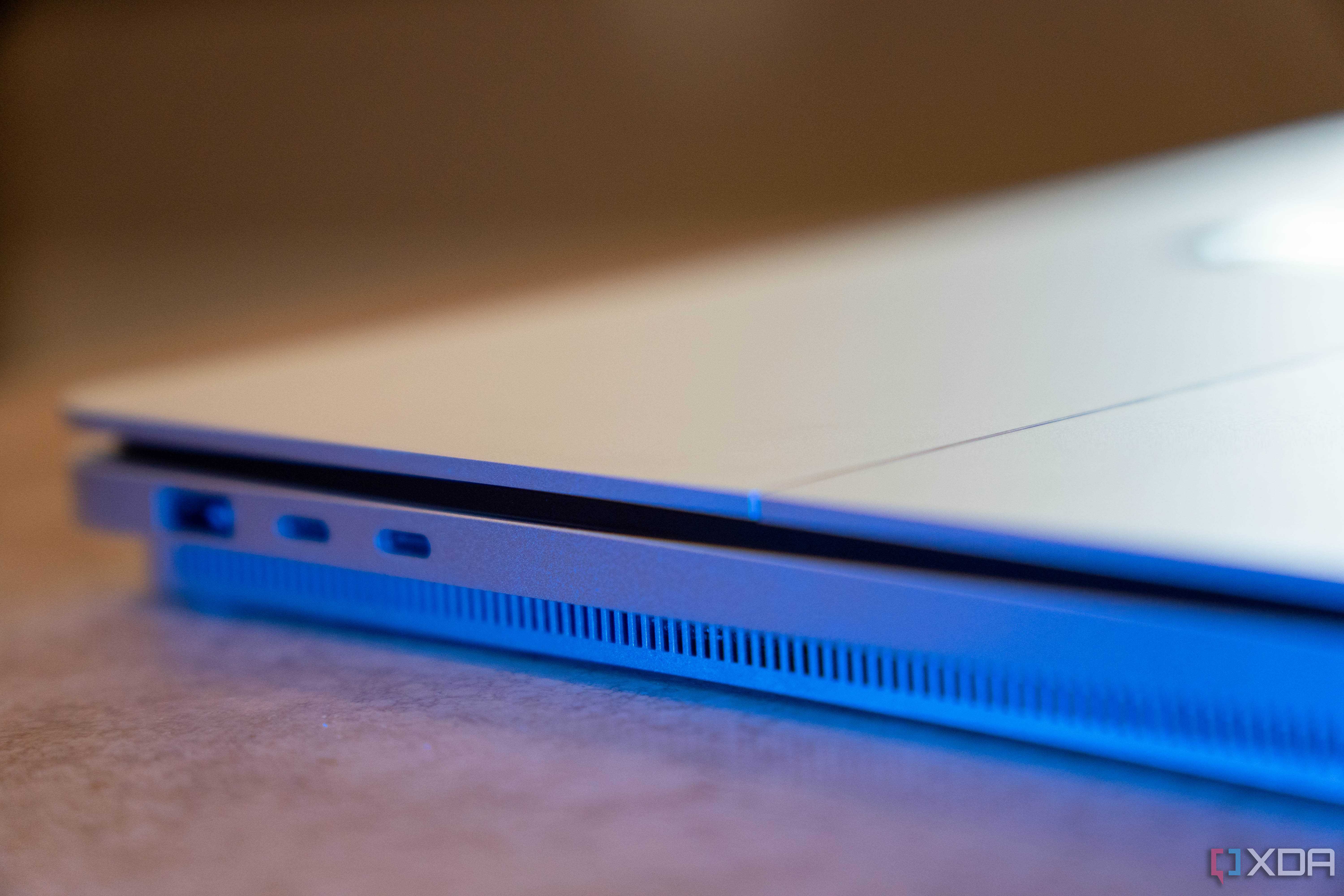 Angled view of two USB-C ports and one USB-A port