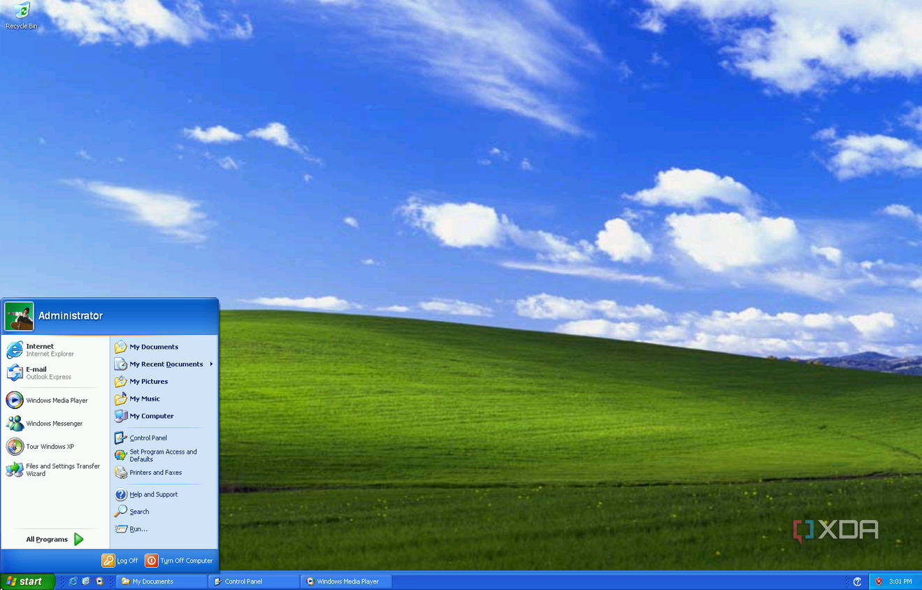 A screenshot of the Windows XP desktop with the Bliss wallpaper