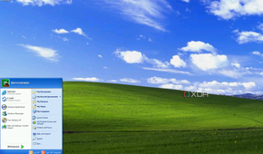A screenshot of the Windows XP desktop with the Bliss wallpaper