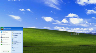 A screenshot of the Windows XP desktop with the Bliss wallpaper