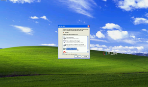 Screenshot of WIndows XP with the AutoPlay dialog shown for a DVD drive