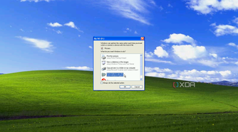 Screenshot of WIndows XP with the AutoPlay dialog shown for a DVD drive