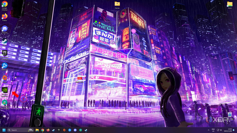 A computer desktop with an arrow pointing to the Geforce Experience Icon