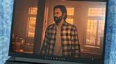 An image showing the Alienware m16 display with Alan Wake 2's screenshot on it.