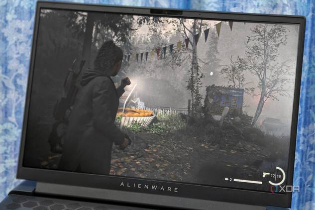 An image showing the Alienware m16 display with Alan Wake 2's screenshot on it.