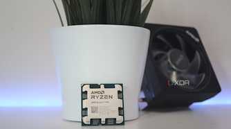 An image showing the AMD Ryzen 7 7700 CPU next to its cooler.