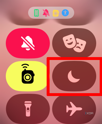 Apple Watch Control Center menu with the Do Not Disturb icon selected.