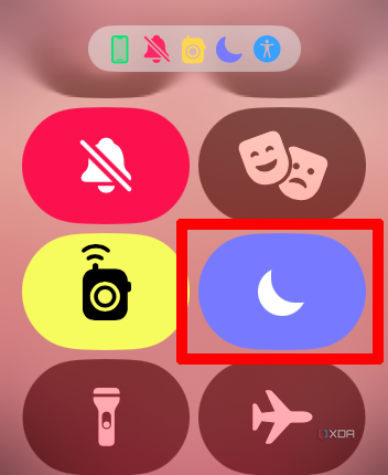 Apple Watch Control Center menu with Do Not Disturb showing as on.