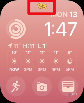 Apple Watch home screen with a tiny Theater Mode icon indicated at the top.