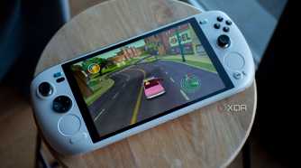 Ayaneo Kun sitting flat on a stool with Simpsons Hit and Run on screen