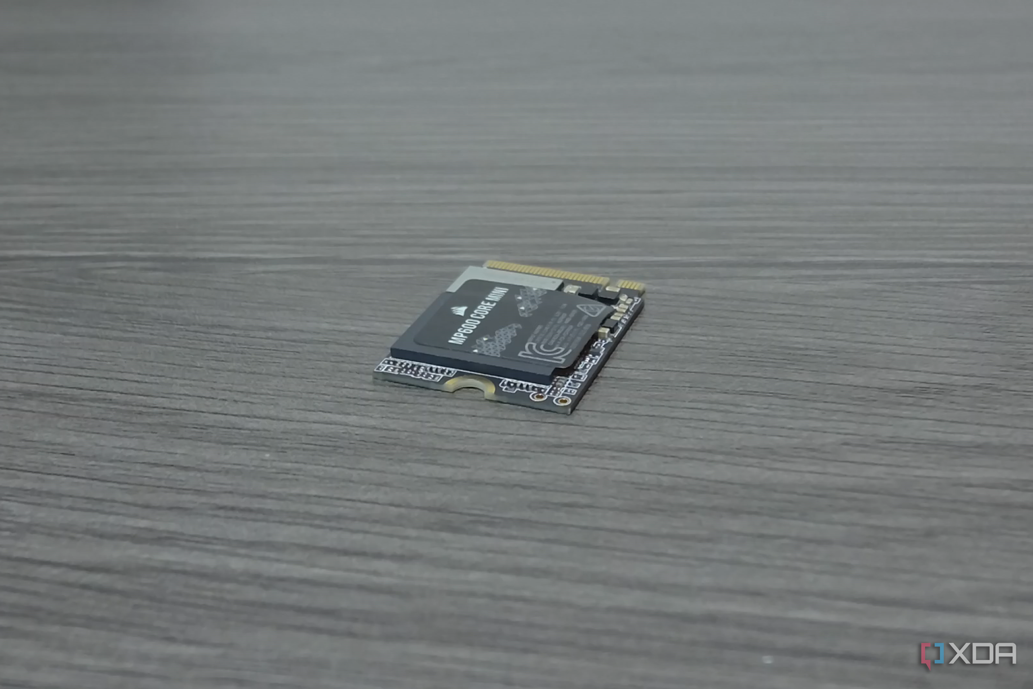 Corsair MP600 Core Mini SSD at an angle.