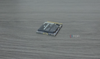 Corsair MP600 Core Mini SSD at an angle.