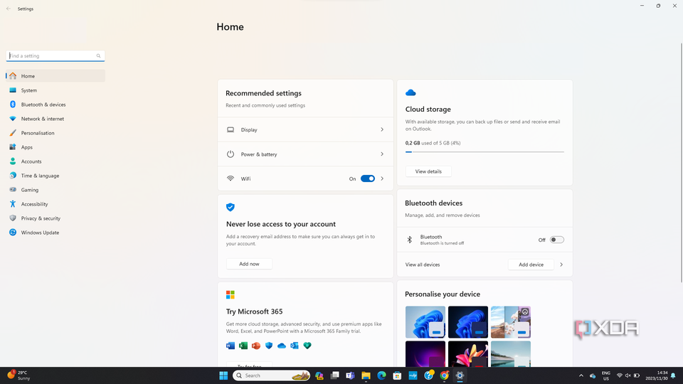 Windows Settings homepage showing various system settings options like System, Bluetooth & devices, and recommended settings such as Display, Power & Battery, and Wi-Fi status.