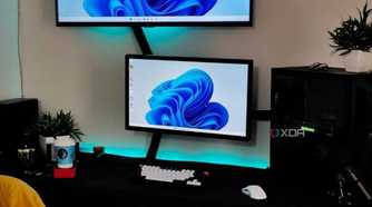 An image showing a dual monitor setup with lots of cables running around the setup.