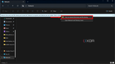 Screenshot of the network page in File Explorer with a banner indicating that network discovery and file sharing are turned off. The banner has been clicked, showing a menu with an option to turn these features on.