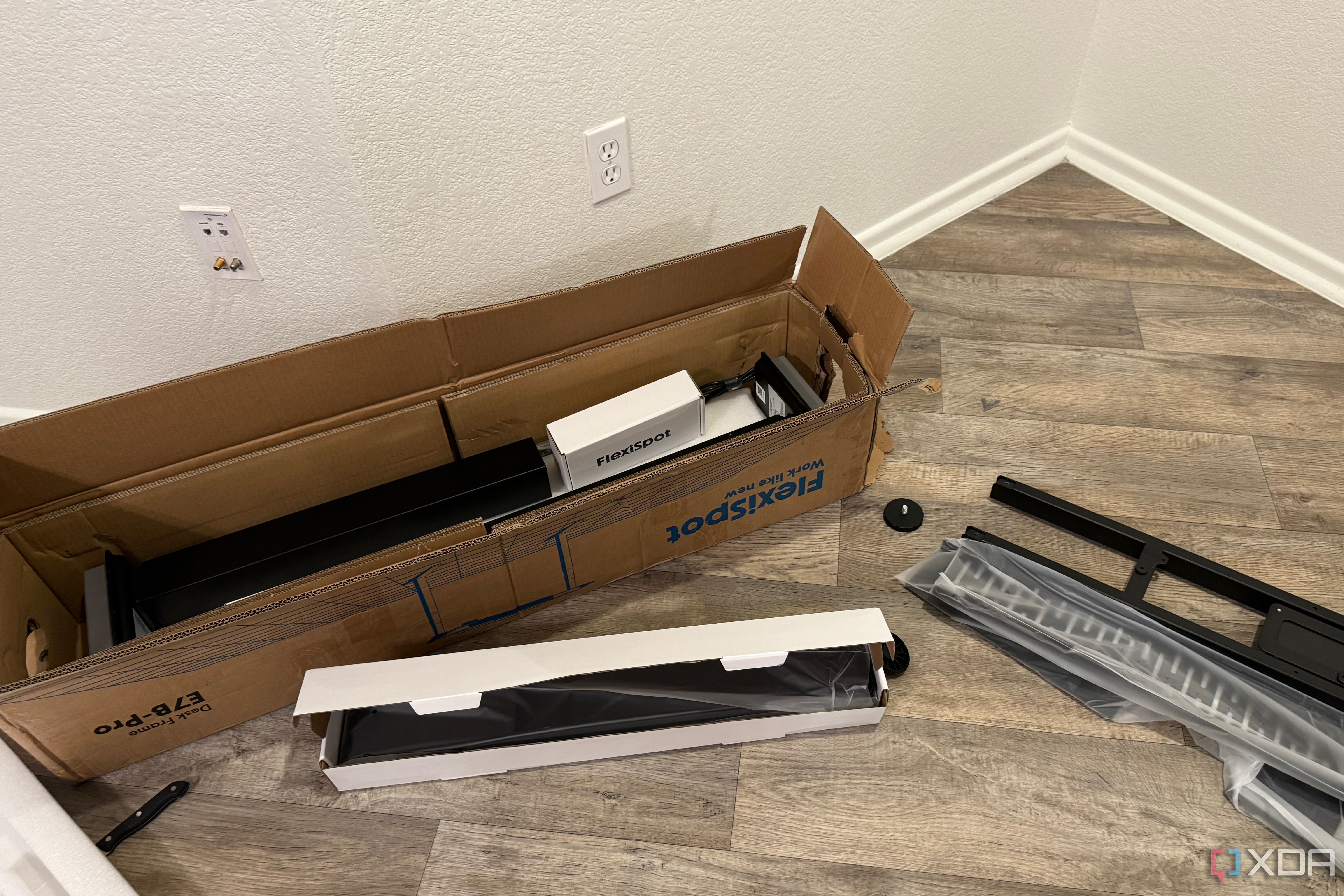 The boxes and parts for the FlexiSpot desk.