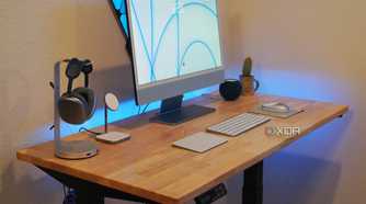 A desk setup on a FlexiSpot E7 Pro standing desk.