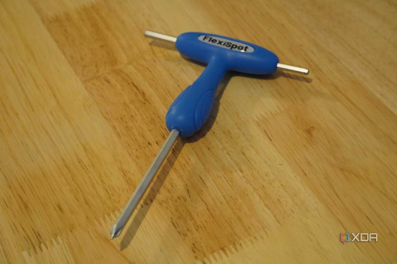 The FlexiSpot screwdriver tool.