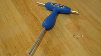 The FlexiSpot screwdriver tool.