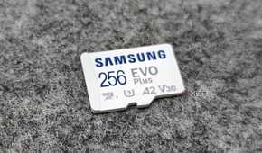 An image showing the front side of a microsd card kept on a felt pad.