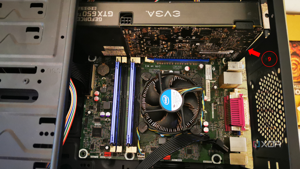 The Interior of a computer case with the graphics card installed and a label marking the ninth step.