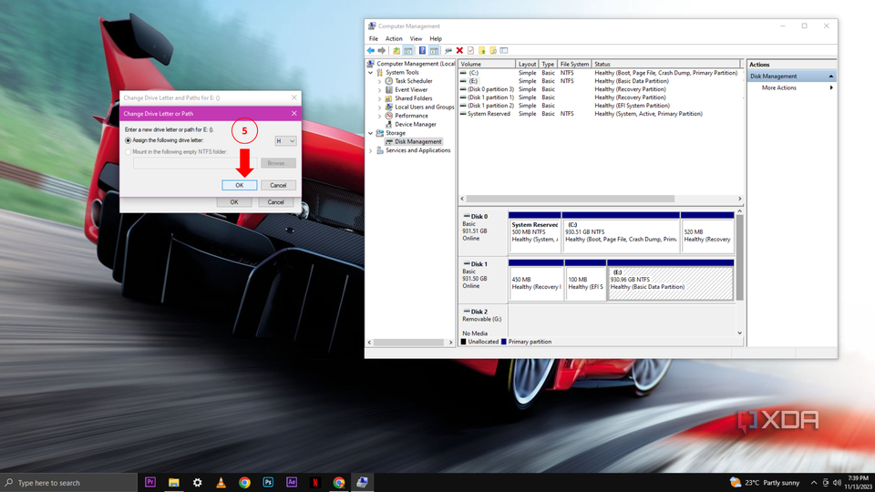 A Windows 10 desktop with the Disk Management tab open and a small window with confirmation of the label change