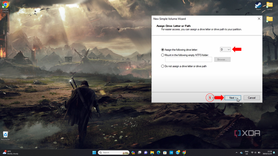 Assigning a drive letter to the new simple volume on the SSD in Disk Management.