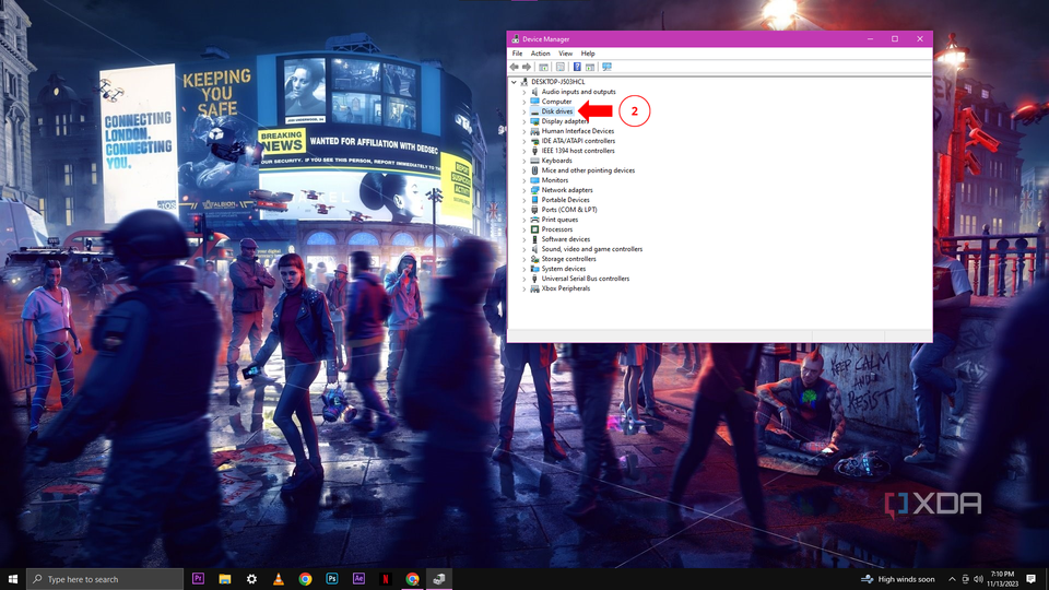 A Windows 10 desktop with the Device manager tab open and the disk drive highlighted