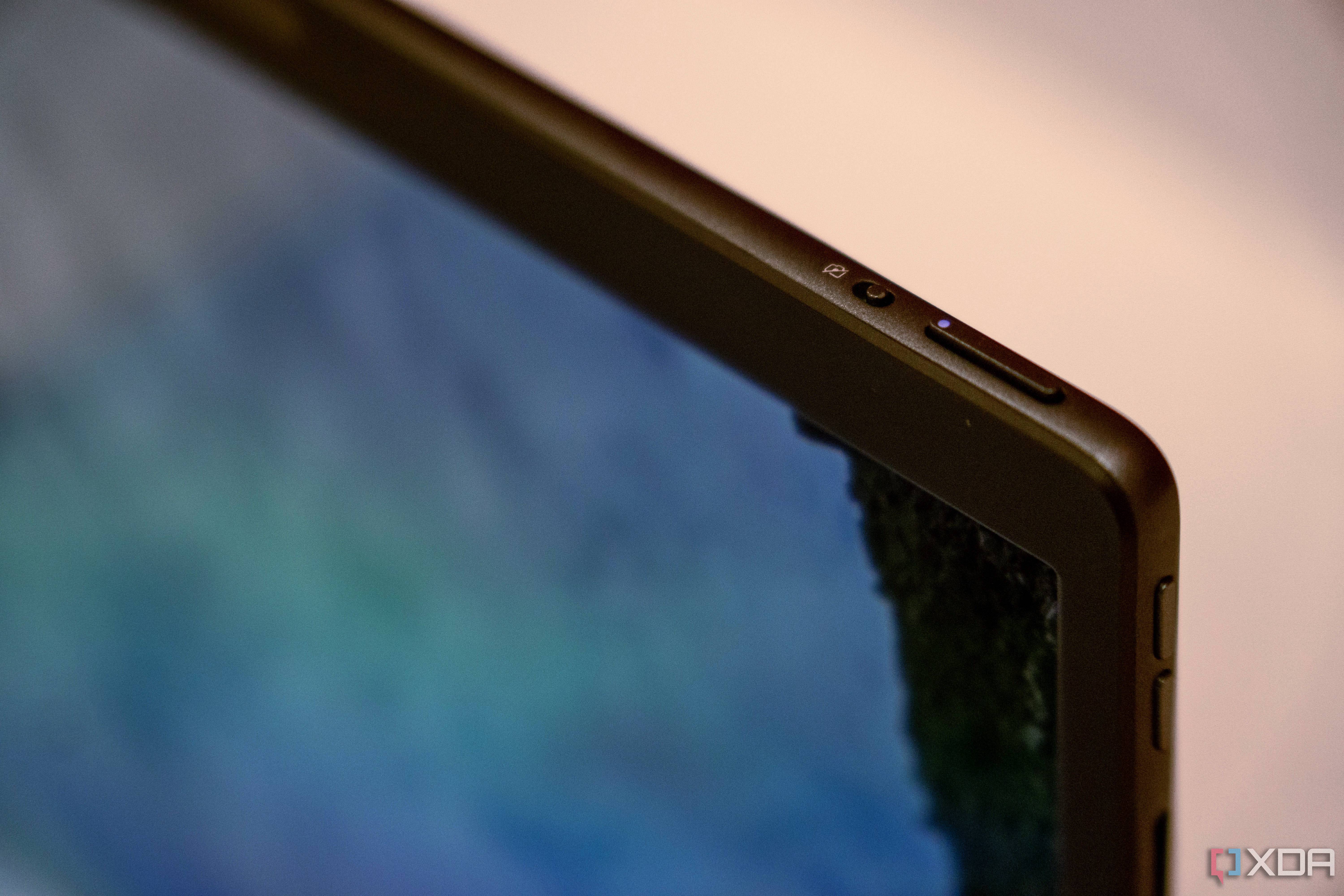 Close up of power button and camera shutter
