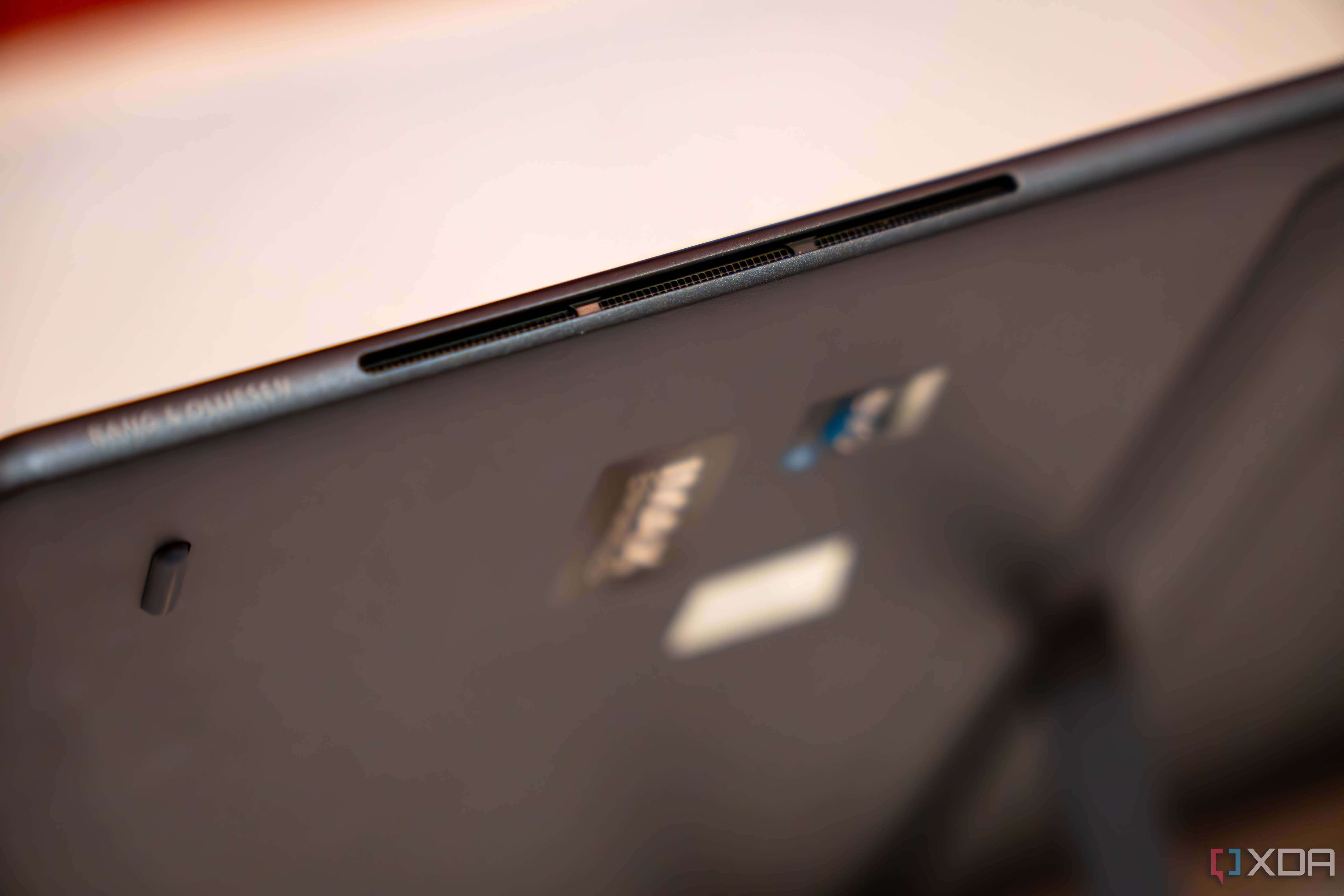 Close up of speakers on a tablet with words Bang and Olufsen