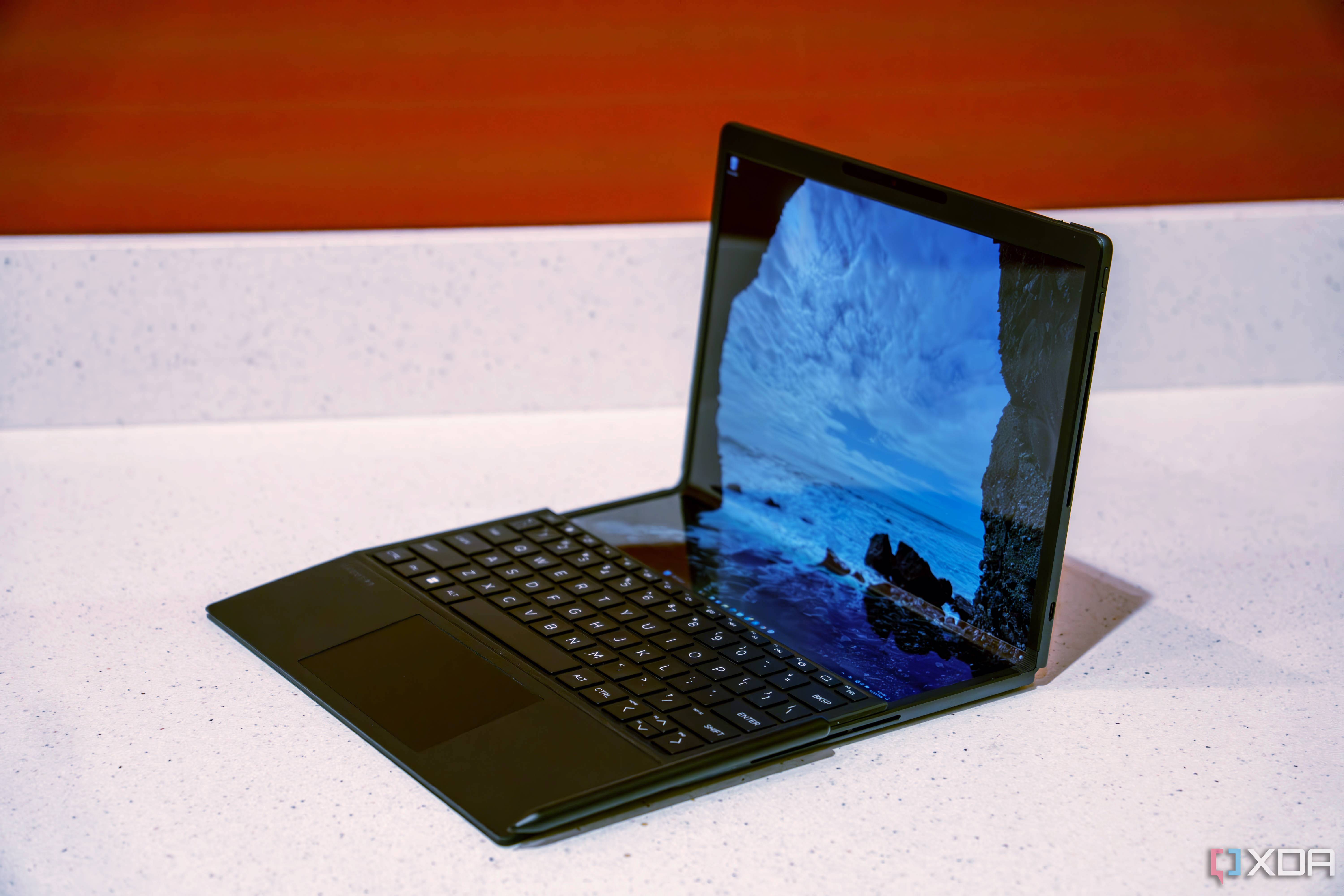 HP Spectre Foldable with keyboard dock and slid down halfway