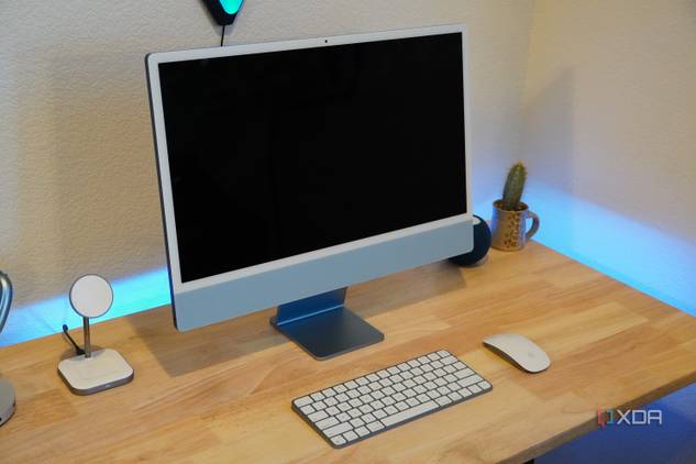 An iMac setup with the display off.
