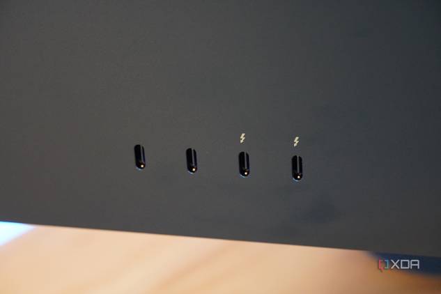 The USB-C ports and Thunderbolt ports on the back of an iMac.