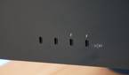 The USB-C ports and Thunderbolt ports on the back of an iMac.