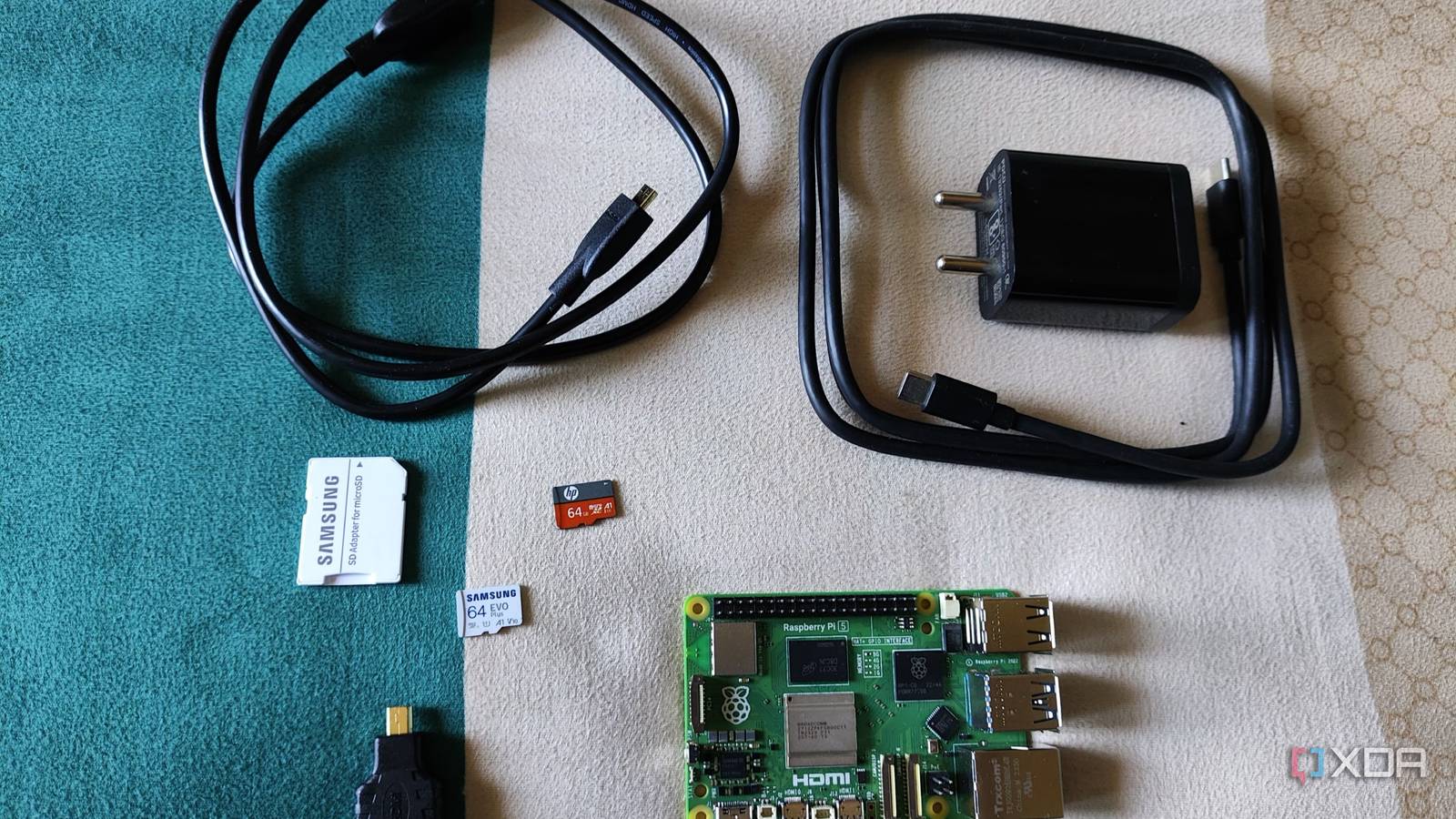 An image of a Raspberry Pi 5 and some of its accessories