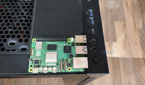 A Raspberry Pi 5 placed on a Gigabyte Aorus AC300W cabinet