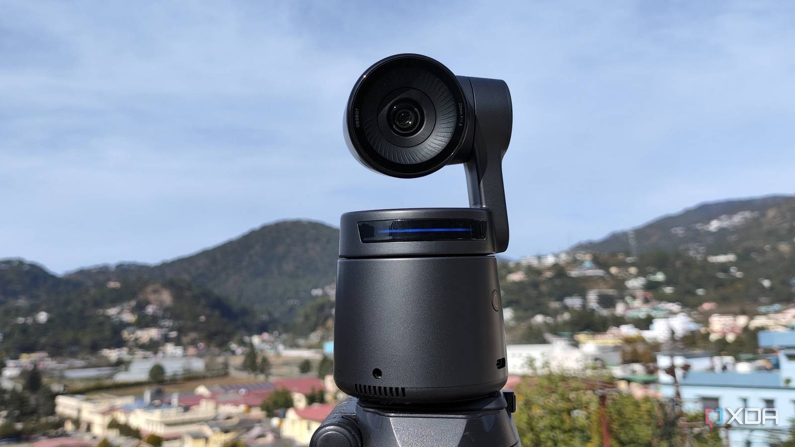 An OBSBOT Tail Air mounted on a tripod