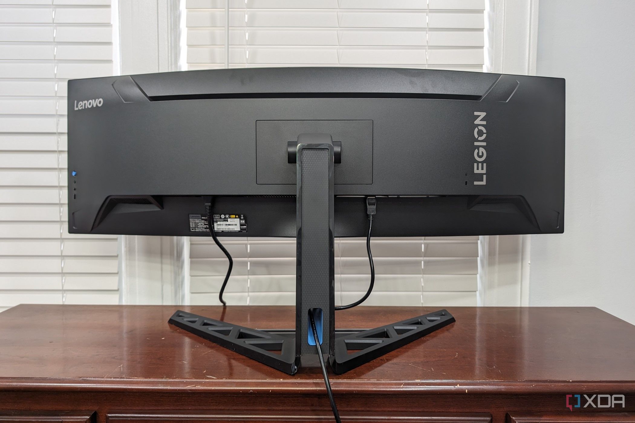 The Legion R45w-30 Monitor sitting on a desk showing the back of the monitor