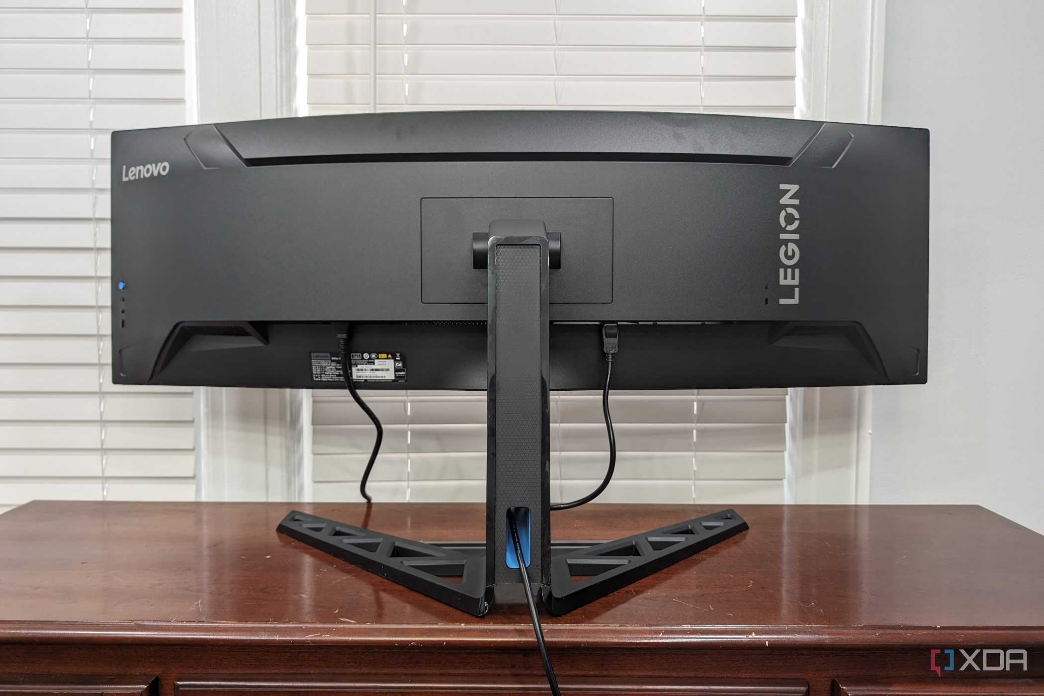 The Legion R45w-30 Monitor sitting on a desk showing the back of the monitor