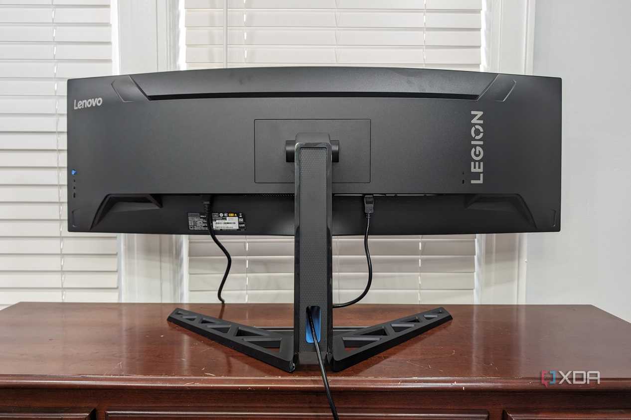 The Legion R45w-30 Monitor sitting on a desk showing the back of the monitor