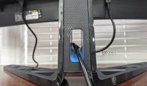 The stand on the Legion R45w-30 Monitor, with an opening for a cable