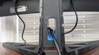 The stand on the Legion R45w-30 Monitor, with an opening for a cable