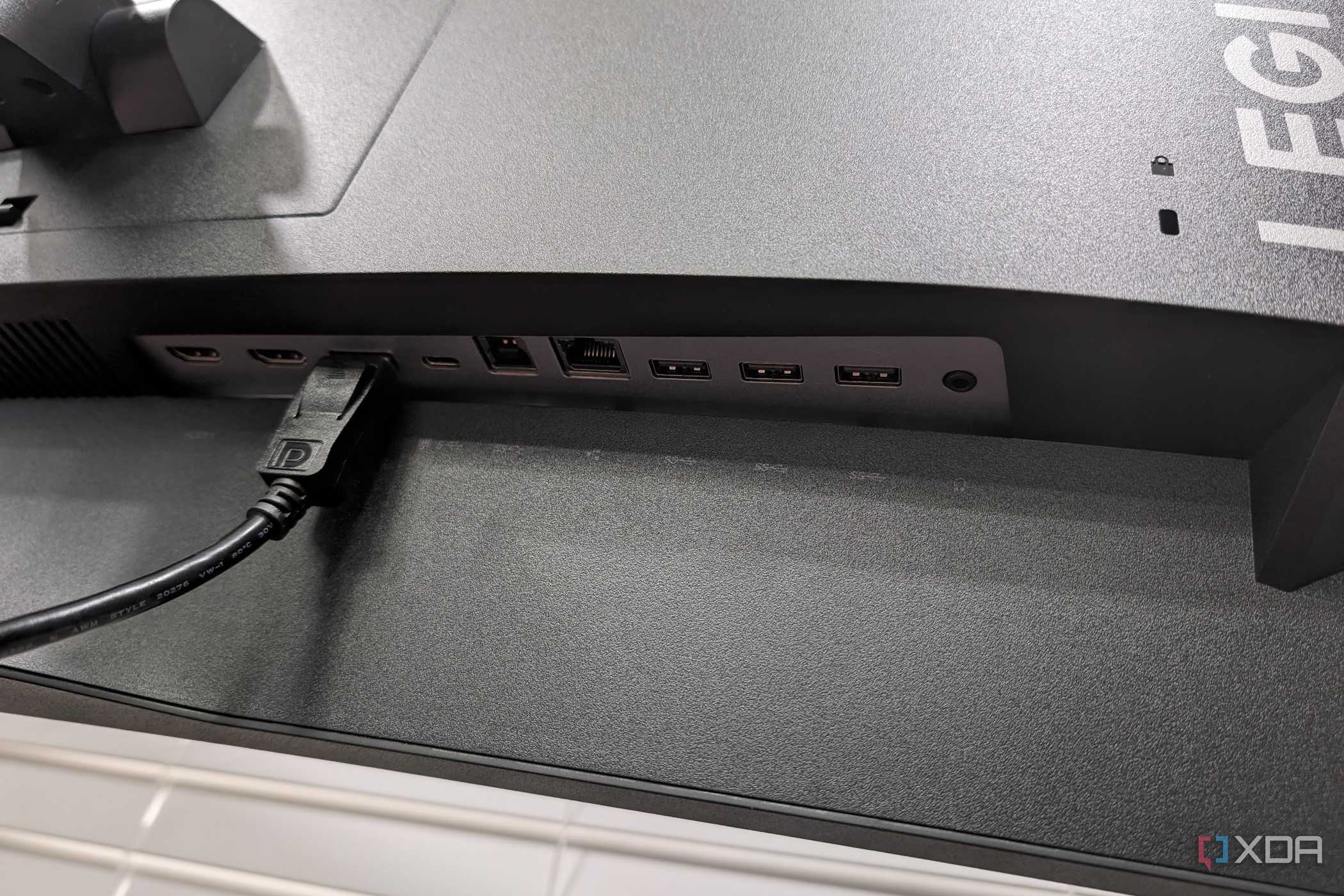 The ports on the back of the Legion R45w-30 Monitor with a DisplayPort cable connected