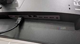 The ports on the back of the Legion R45w-30 Monitor with a DisplayPort cable connected